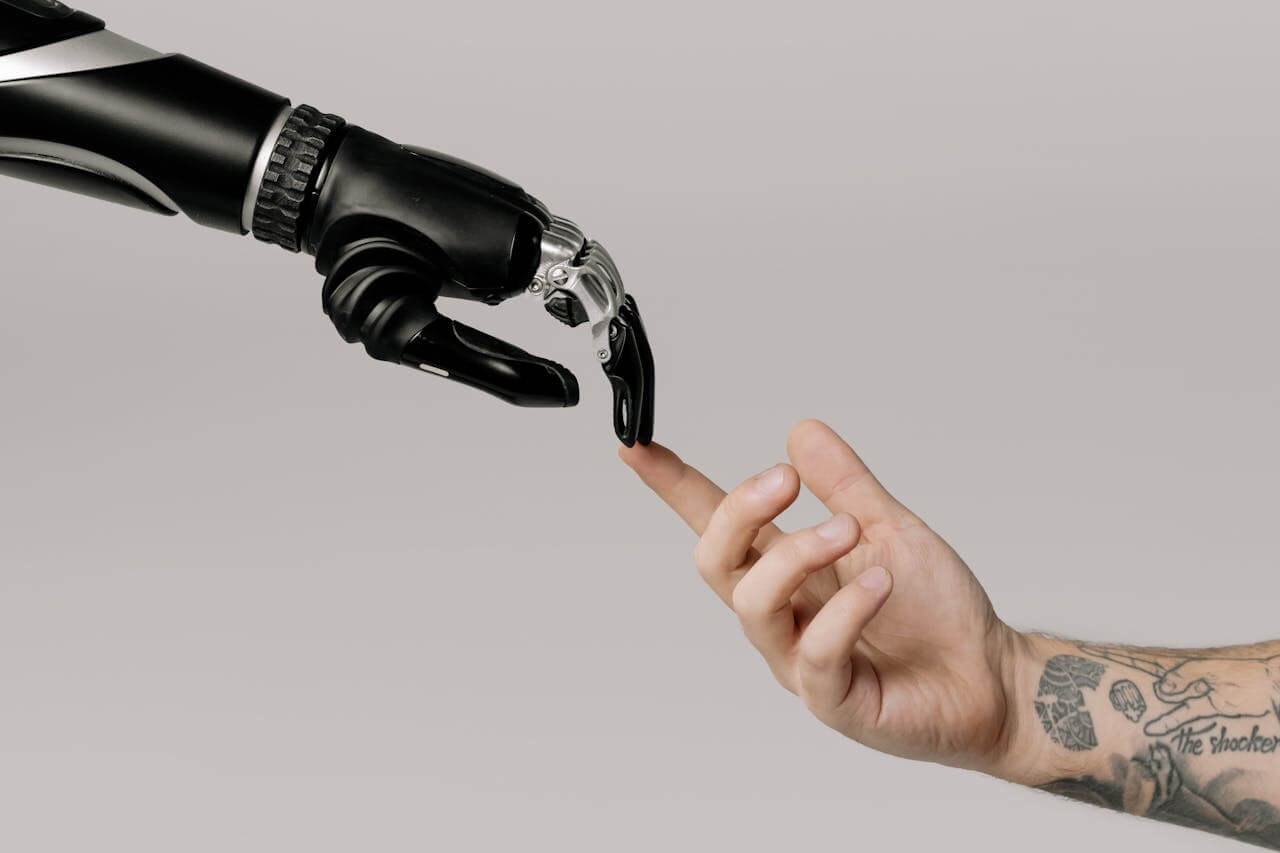 Robot Hand reaching out for human hand